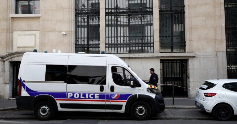 French police outside Bank of America Paris headquarters