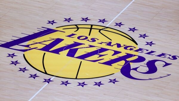 Lakers Owner Stays Put Amid Ownership Shift