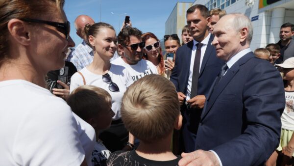 Putin visits disputed islands, Japan protests